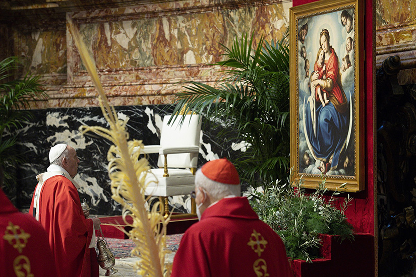 Pope Francis venerated a Marian image during Palm Sunday Mass in St. Peter’s Basilica at the Vatican March 28. At his audience March 24, the pope said that Mary occupies a privileged place in the lives of Christians, and therefore, in their prayer as well, because she is the mother of Jesus.