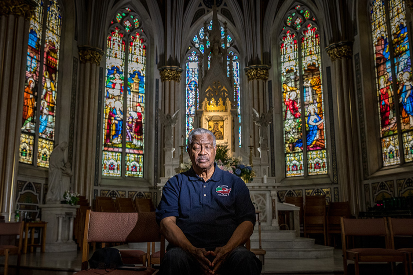 Ben Phillips is one of nine siblings who grew up in the former St. Bridget Parish across from his home in the Pruitt-Igoe housing complex. He has fond memories of the church and the pastor, Msgr. John Shocklee, who had a powerful impact on the Civil Rights movement in St. Louis. He is pictured praying at his current parish, St. Alphonsus Ligouri “Rock” Church in St. Louis on April 8.