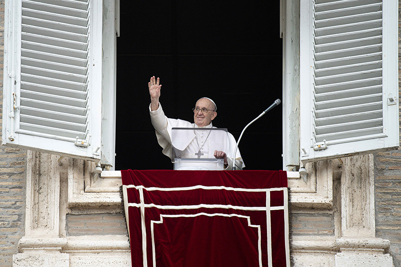 Pope Francis greeted the crowd as he led the Angelus from the window of his studio overlooking St. Peter’s Square at the Vatican July 25.