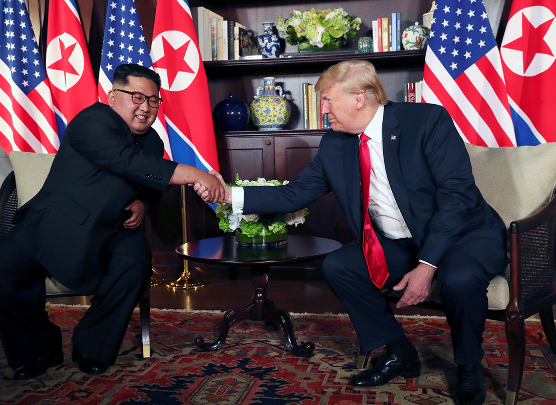 North Korea’s leader Kim Jong Un shook hands with U.S. President Donald Trump before their bilateral meeting on Sentosa island in Singapore June 12. Signing a joint statement, President Trump agreed to provide security guarantees to North Korea and Chairman Kim reaffirmed his commitment to the complete denuclearization of the Korean Peninsula.