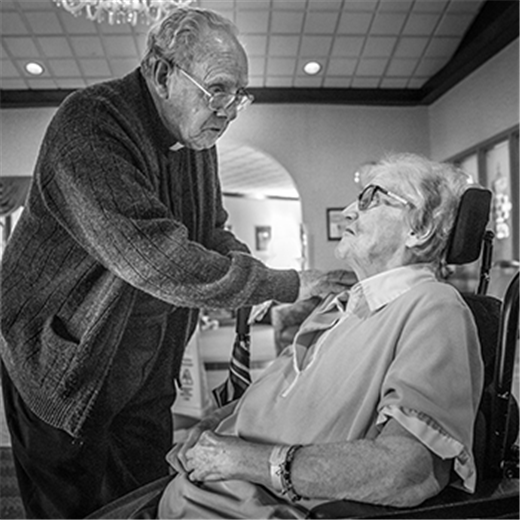 Msgr. Leach, parishioners bring joy to nursing homes