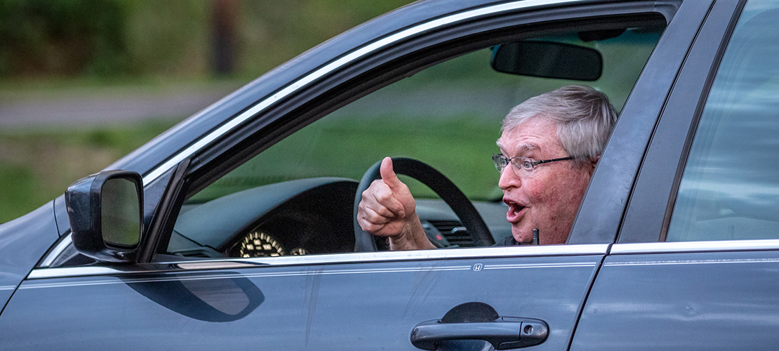Father Jack’s Conversational Car stops for parishioners