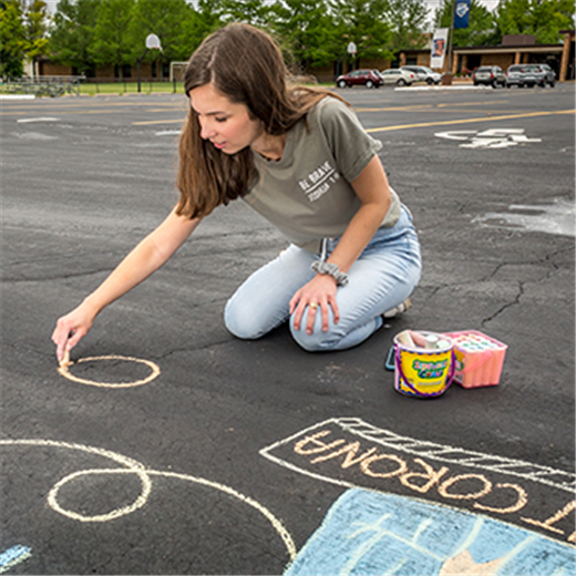 Home from college, St. Cletus parishioner spreads positivity through chalk art