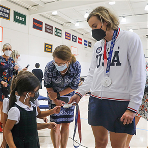Olympic champion gets hero’s welcome at Maryland Catholic school alma mater