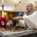 South City Catholic Academy celebrates three student baptisms at all-school Mass