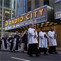 Eucharistic processions — in midtown Manhattan and across the Mississippi River — bring Jesus to the world
