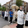 ‘We have to show Christ to the people’ | Catholics process through city streets in archdiocesan Corpus Christi procession
