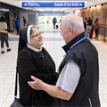 Through airport chaplaincy, permanent deacons offer listening ears, spiritual support to travelers and employees