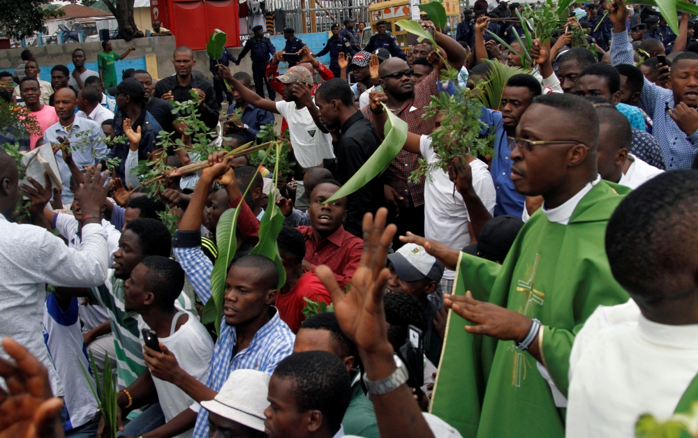 A priest and other demonstrators chanted slogans at a protest organized by Catholic activists in
Kinshasa, Congo. At least six people were killed during demonstrations across the country against
Congolese President Joseph Kabila and delayed elections.