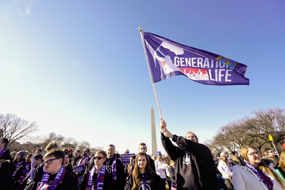 Michael Throm, from St. Joseph Parish in Imperial, wielded the Generation Life banner at the March for Life. Throm has attended eight marches.