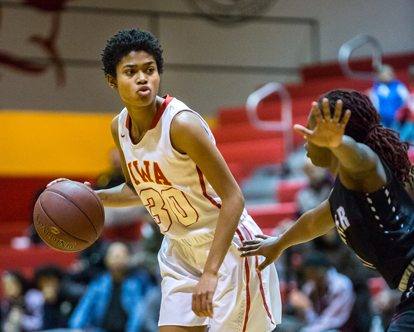 Incarnate Word Academy's Marisa Warren looked to pass against Cardinal Ritter College Prep. Warren scored 13 points to lead Incarnate Word in the team’s 57-18 victory over Cardinal Ritter.