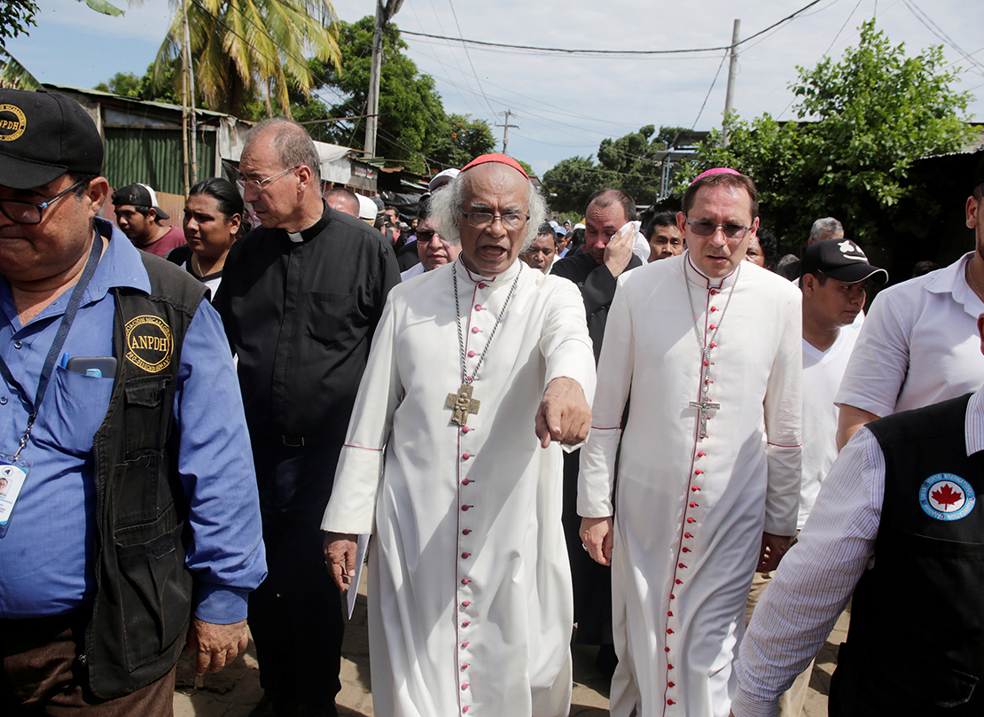 Cardinal Leopoldo Brenes Solorzano and Archbishop Waldemar Sommertag, apostolic nuncio to Nicaragua, walked in Masaya, Nicaragua, June 21 as clashes between anti-government protesters and police continue.