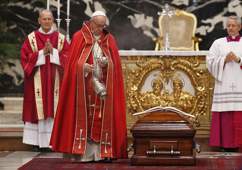Pope Francis used incense to bless the casket of French Cardinal Jean-Louis Tauran during his funeral Mass in St. Peter’s Basilica at the Vatican July 12. Cardinal Tauran, who announced the election of Pope Francis, died July 5 at the age of 75 in Hartford, Conn.