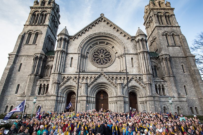 After the Generation Life STL procession to Planned Parenthood, young people gathered on the steps of the Cathedral Basilica before heading into Mass in January 2016. 