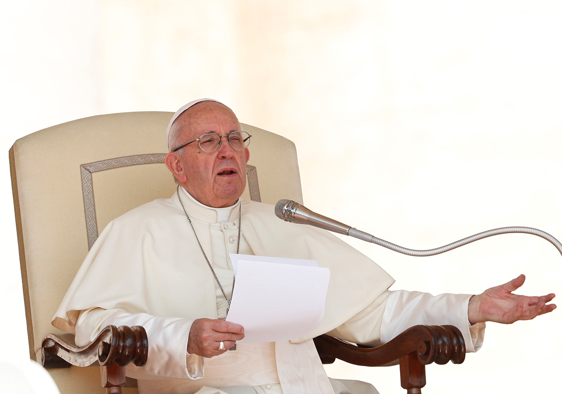 Pope Francis gestured as he led his general audience in St. Peter’s Square Aug. 29 at the Vatican.