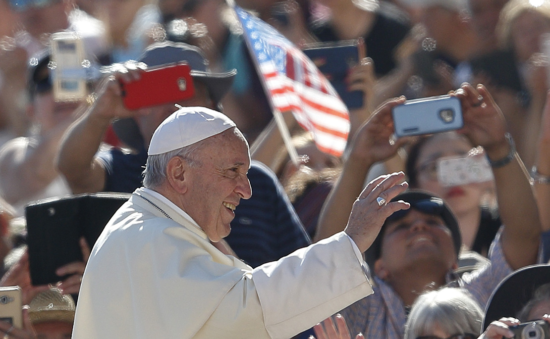 Pope Francis greeted the crowd during his general audience in St. Peter’s Square at the Vatican Sept. 12.