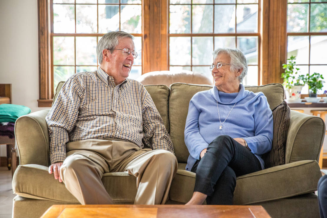 Joseph and Nancy Mueller sat on the couch in their living room on Oct. 16. The couple received the Missouri Catholic Conference Citizen Recognition Award at the assembly Oct. 6. They have a long history of serving the poor and will celebrate 58 years of marriage in November.