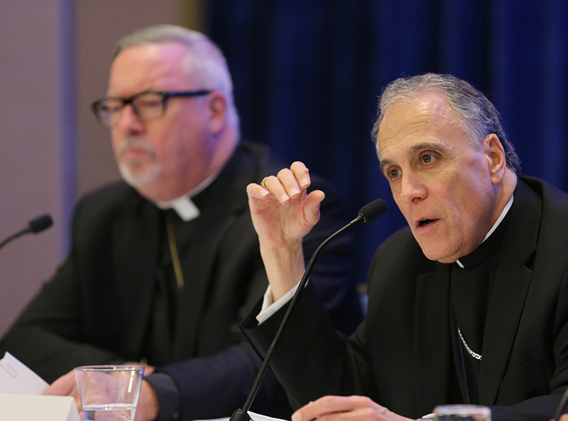 Bishop Christopher J. Coyne of Burlington, Vt., left, looked on as Cardinal Daniel N. DiNardo of Galveston-Houston, president of the U.S. Conference of Catholic Bishops, responded to a reporter’s question during a news conference in 2017 at the bishops’ fall general assembly in Baltimore.
