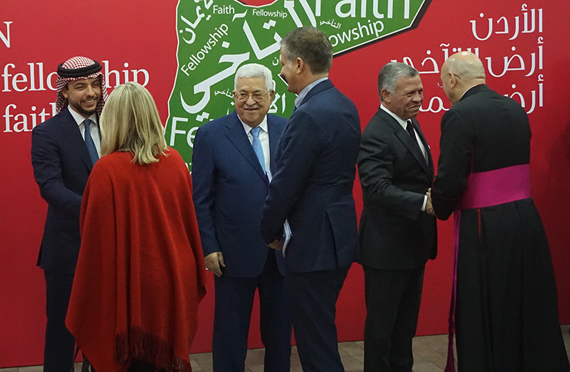 Jordan’s King Abdullah II, second from right, Palestinian President Mahmoud Abbas, center, and Jordan’s Crown Prince Hussein bin Abdullah II greeted Christians during Christmas celebrations hosted by the Jordanian monarch at the King Hussein Cultural Center in Amman Dec. 18.