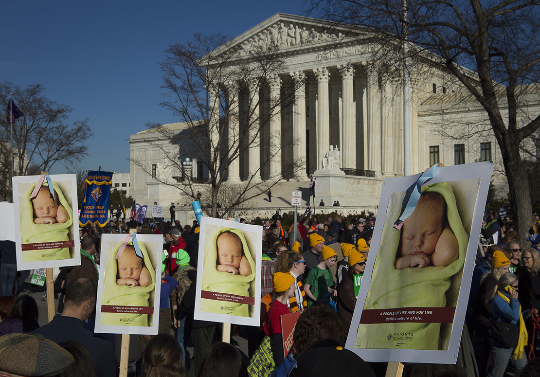 Pro-life advocates gathered near the U.S. Supreme Court in Washington Jan. 19, 2018. The novena “9 Days for Life” and related observances sponsored by the bishops’ pro-life secretariat lead up to the annual Day of Prayer for the Legal Protection of Unborn Children Jan. 22, the anniversary of the Supreme Court’s 1973 decisions in Roe v. Wade and Doe v. Bolton that legalized abortion.