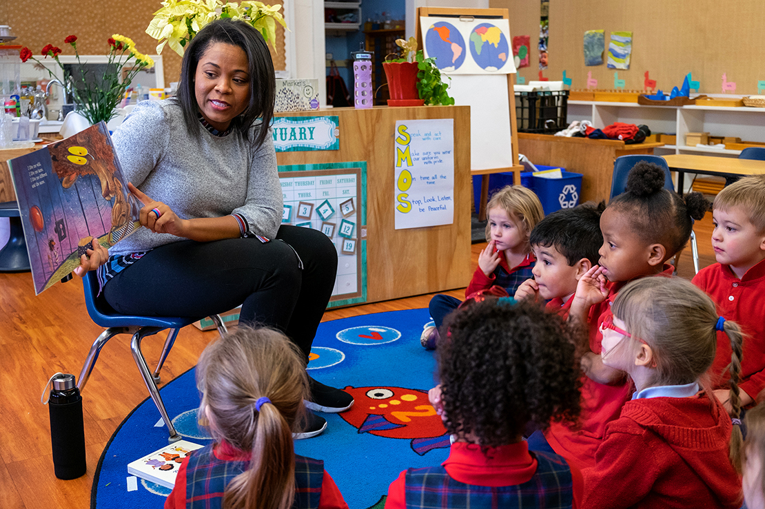 Arsenia Tate read to pre-k students at St. Margaret of Scotland School in St. Louis Jan. 22. Tate is the school’s coordinator of inclusion, diversity and equity and aims “to create this model for culturally responsive teaching, have a five-year plan and hand it over to all the Catholic schools,” she said.