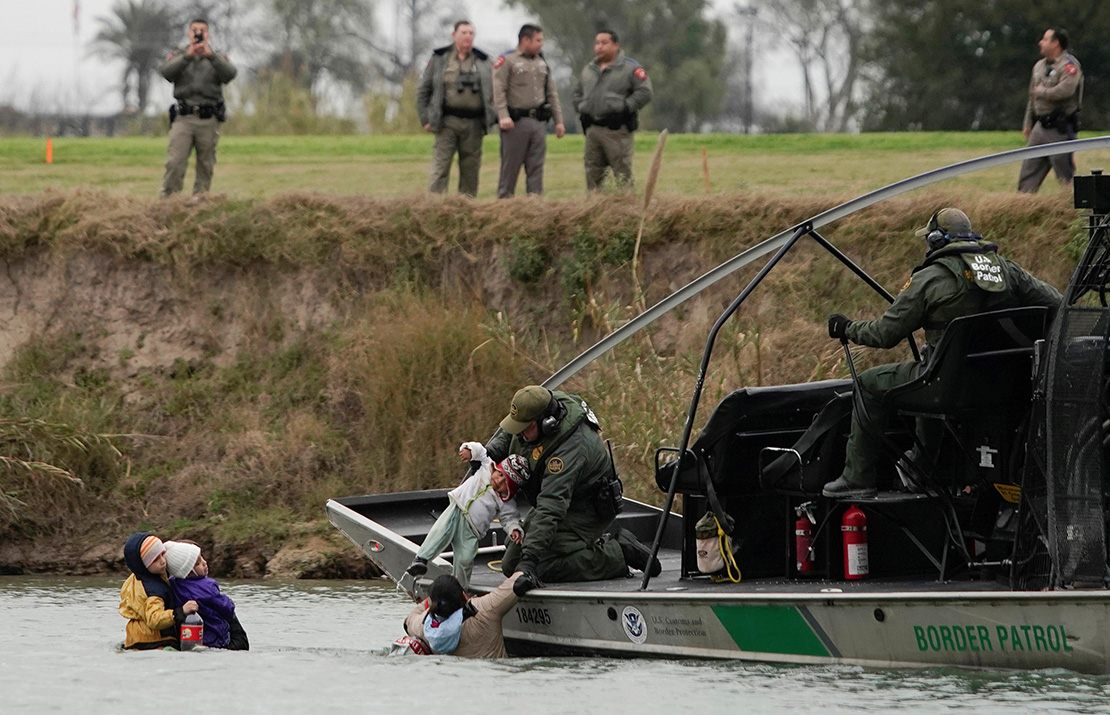 A U.S. Border Patrol boat rescued migrants crossing the Rio Grande toward the United States, seen from Piedras Negras, Mexico, Feb. 10.