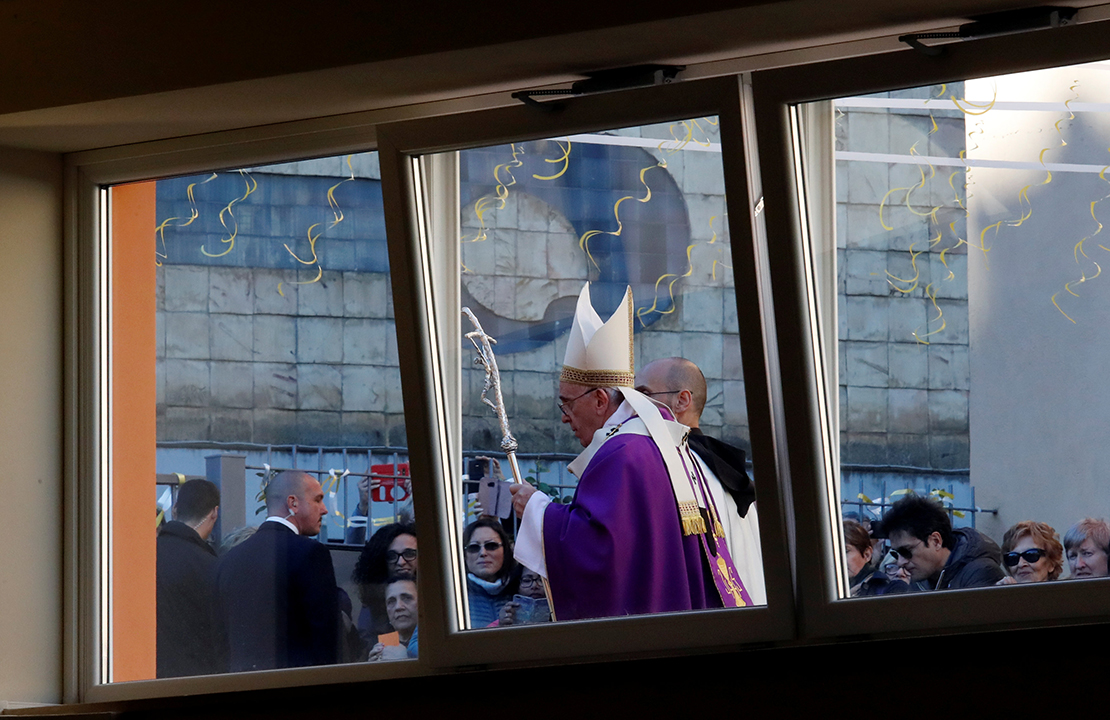 Pope Francis arrived to celebrate Mass at the Parish of St. Julius in Rome April 7.