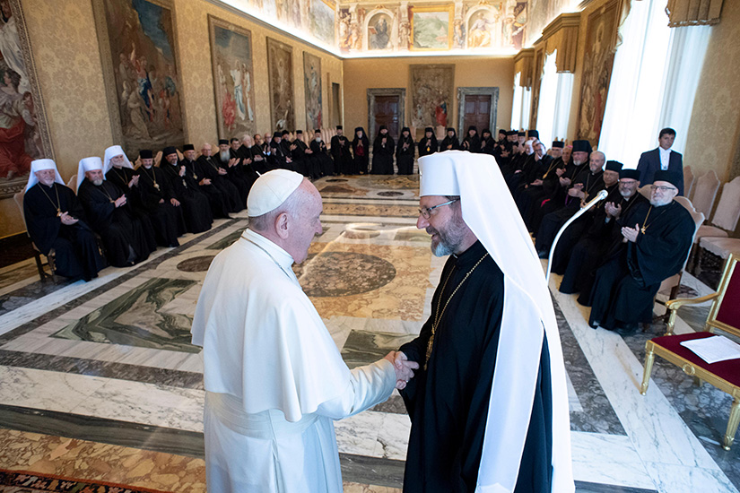 Pope Francis greeted Archbishop Sviatoslav Shevchuk of Kyiv-Halych, head of the Ukrainian Catholic Church, at the Vatican Sept. 2. The 47 bishops from Ukrainian dioceses in Ukraine and 10 other nations, including the United States, Canada and Australia, met the pope during their synod in Rome.