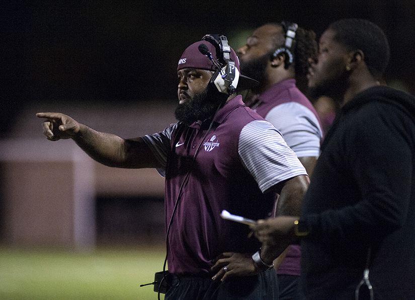 Cardinal Ritter College Prep football coach Brandon Gregory called instructions to his team during a game in 2017.  Gregory was released from his duties as coach Oct. 18 following the team playing an ineligible player earlier this season.