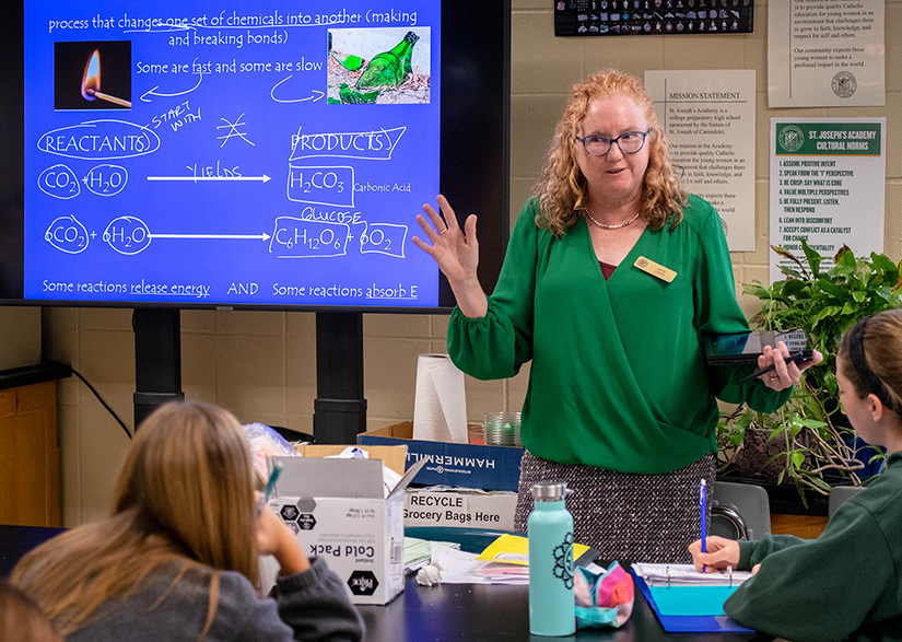 St. Joseph’s Academy science teacher Katie Lodes instructed an honors biology class for freshmen on chemical reactions Oct. 25. Lodes, who has taught at St. Joseph’s for 19 years, recently received the Presidential Award for Excellence in Mathematics and Science Teaching (PAEMST) facilitated by the White House Office of Science and Technology Policy.