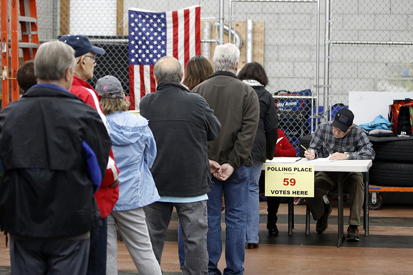 Voters lined up prior to casting ballots at a polling station in Nesconset, N.Y., on Election Day Nov. 6, 2018. 
