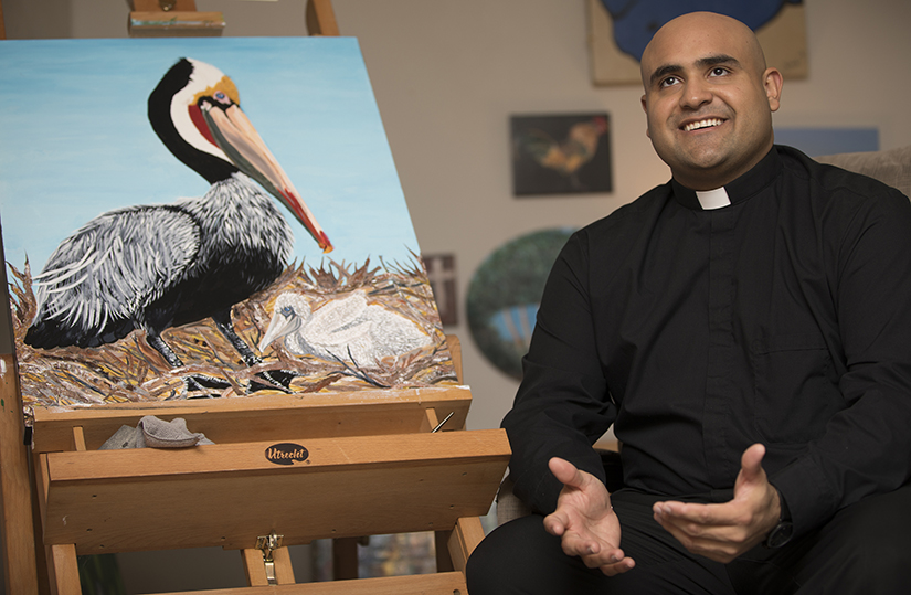 Deacon Elmer Herrera-Guzman, a fourth-year theology student, talked about his artwork at Theological College in Washington Oct. 25. Studying to be ordained a priest of the Diocese of Dallas, he is in his final year at the college.