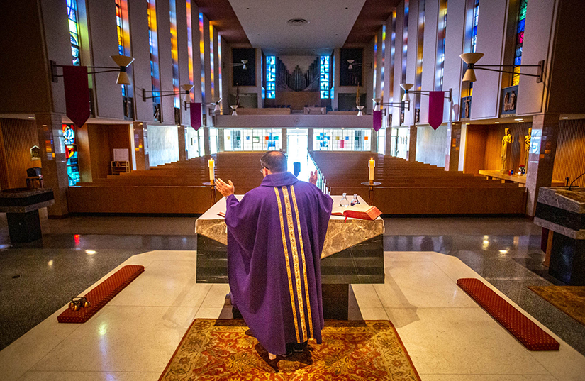 Photos by Lisa Johnston | lisajohnston@archstl.org | Twitter: @aeternusphoto

Father Craig Holway celebrated Mass “sine populo” (without people) at St. Joan of Arc Church in St. Louis, Missouri on Tuesday, March 17. While public Masses are suspended until April 6, priests still celebrate Mass without a congregation.