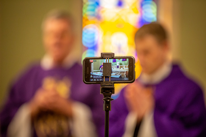 Father Timothy Foy celebrated Mass, assisted by Deacon Randy Maune, at St. John the Baptist (Gildehaus) Church in Villa Ridge March 21. The Mass was livestreamed via Facebook. Regular Mass attendance on a Saturday morning is usually 10-20 people, but more than 100 people watched the livestream.