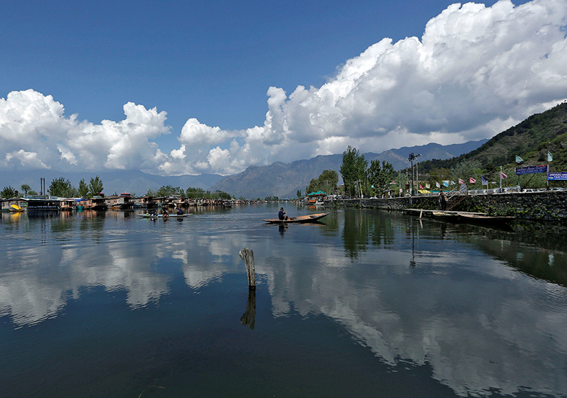 A man rowed his boat on the waters of Dal Lake in Srinagar, India, April 2. Earth Day, the annual United Nations event, is celebrated every April 22 as a way to call attention to protecting the earth’s natural resources.