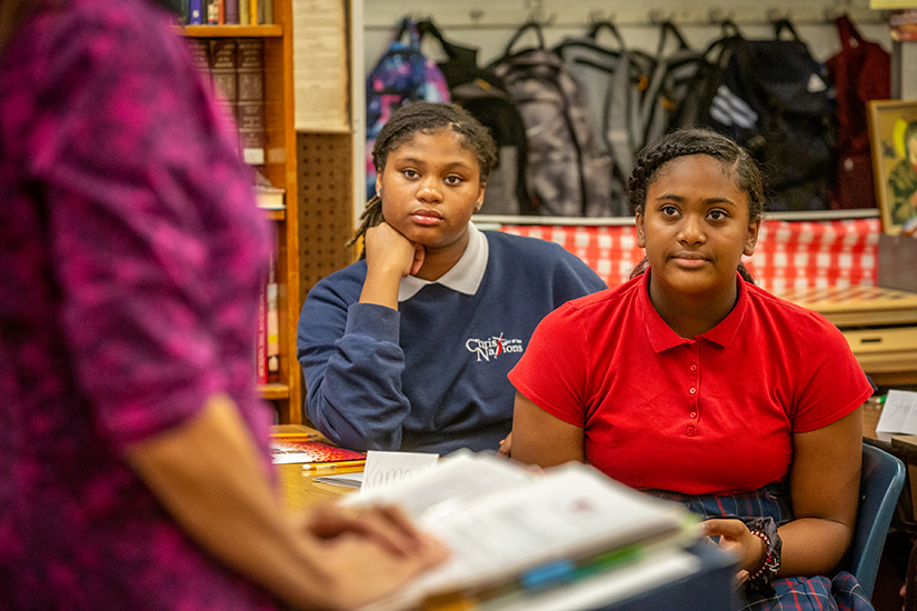 Natasha Hamilton and Kamari Brown listened as Terry Trafton taught the Right START program to eighth-graders at Christ Light of the Nations school in Spanish Lake in Sept. 2019.