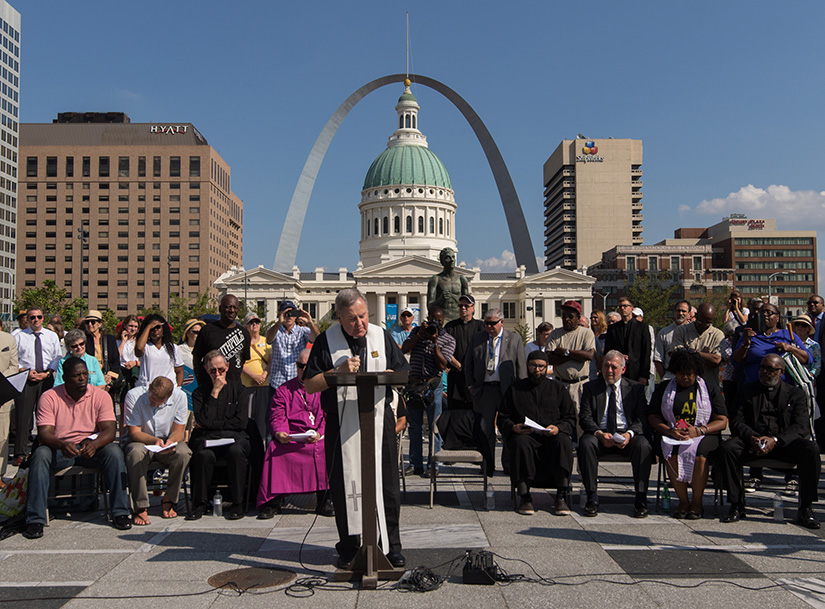 Archbishop Robert J. Carlson welcomed people to the Interfaith Prayer Service for Peace and Solidarity Sept. 19, 2017 at Kiener Plaza in Downtown St. Louis.