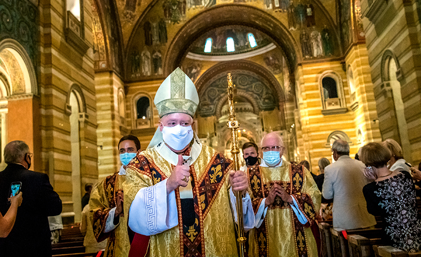 Archbishop Mitchell Rozanski processed out of the Cathedral Basilica of Saint Louis at the end of his installation Mass as the 10th Archbishop of St. Louis Aug. 25.