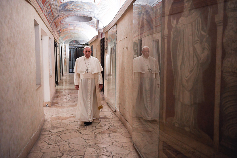 Pope Francis walked through the crypt of St. Peter’s Basilica to pray at the tombs of deceased popes at the Vatican on All Souls’ Day, Nov. 2.