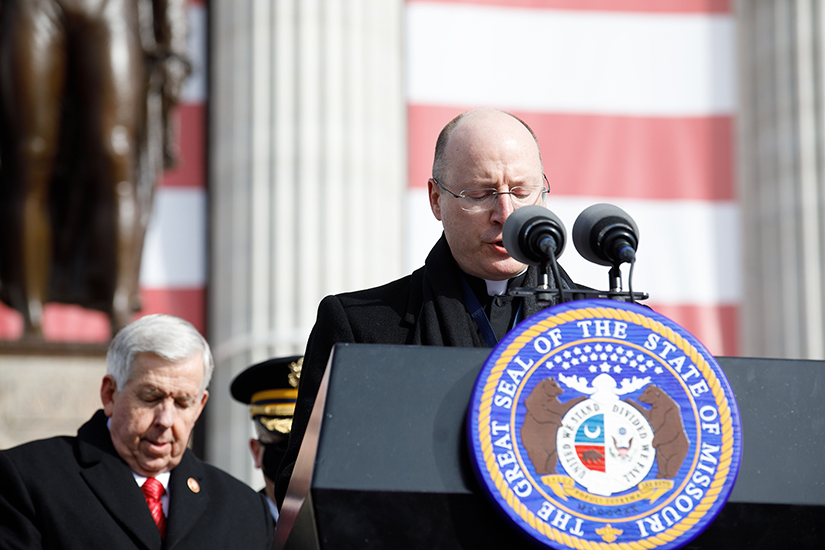 Bishop W. Shawn McKnight of Jefferson City, Mo., prayed at the end of the inauguration ceremony for members of Missouri's executive branch outside the state Capitol in Jefferson City Jan. 11. The event also marked the beginning of a yearlong celebration for Missouri's bicentennial of statehood.