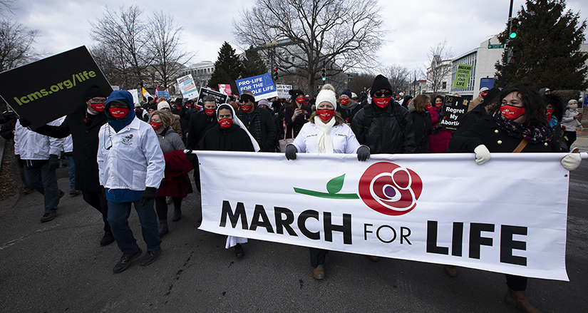 March for Life participants made their way to the U.S. Supreme Court building in Washington Jan. 29, amid the coronavirus pandemic. 