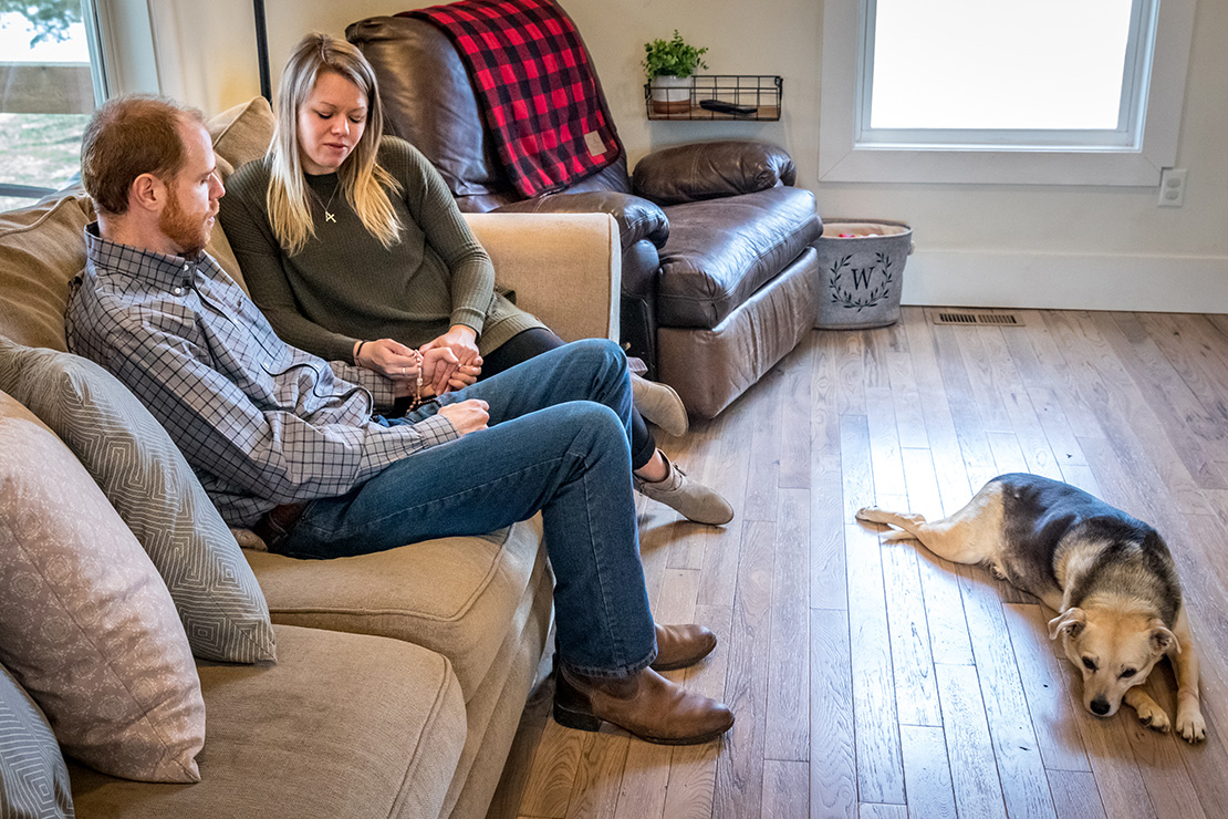 Katie and Geoff Wester are part of a Worldwide Marriage Encounter group that is based on the Ignatian Spiritual Exercises. They prayed the Rosary together (with their dog Bailey sleeping on the floor) at their home in St. Paul on Feb. 2.
