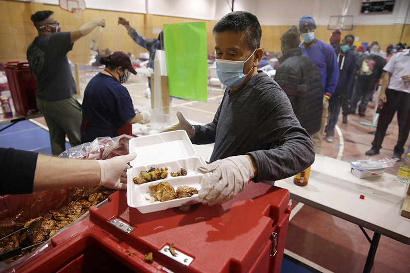 Volunteers handed out meals at a Salvation Army facility in Plano, Texas, Feb. 18 after winter weather caused electricity blackouts.
