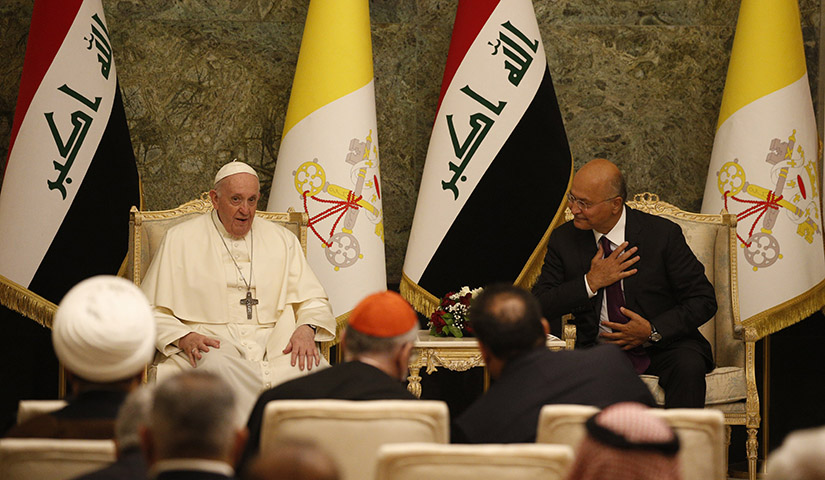 Pope Francis and Iraqi President Barham Salih attended a meeting with authorities, civil society leaders and members of the diplomatic corps in the hall of the presidential palace in Baghdad March 5.