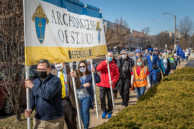 Archbishop Mitchell Rozanski and other participants marched during the March on the Arch pro-life event that began at Planned Parenthood. This year, the format changed so marchers walked on a 1.5-mile prayer walk.