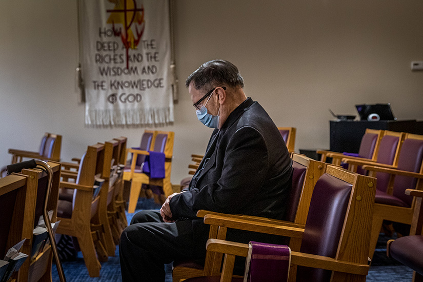 Father Patrick Ryan prayed in the chapel at Regina Cleri home for retired priests in St. Louis on March 12. Though retired, Father Ryan continues to help at a former parish, St. Robert Bellarmine in St. Charles, where he was pastor from 2005-19.