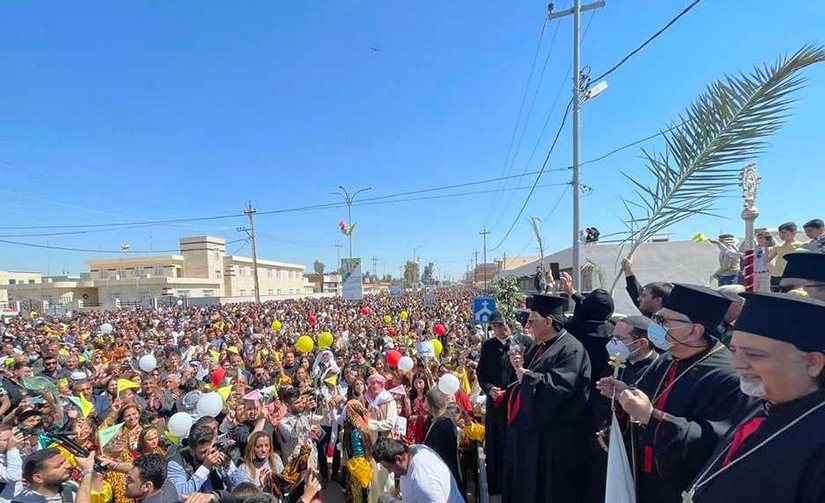 Syriac Catholic Patriarch Ignace Joseph III Younan, visiting from the patriarchate in Beirut, spoke following a Palm Sunday procession outside the Church of St. John the Baptist in Qaraqosh, Iraq, March 28.
