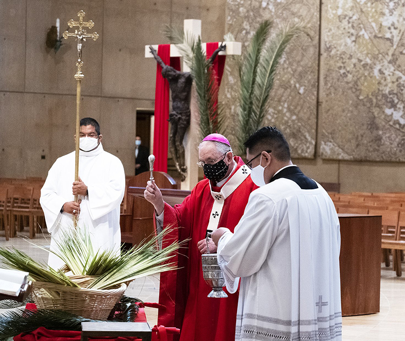 Archbishop Jose. Gomez of Los Angeles, president of the U.S. Conference of Catholic Bishops, blessed palms at the Cathedral of Our Lady of the Angels in Los Angeles on Palm Sunday, March 28.