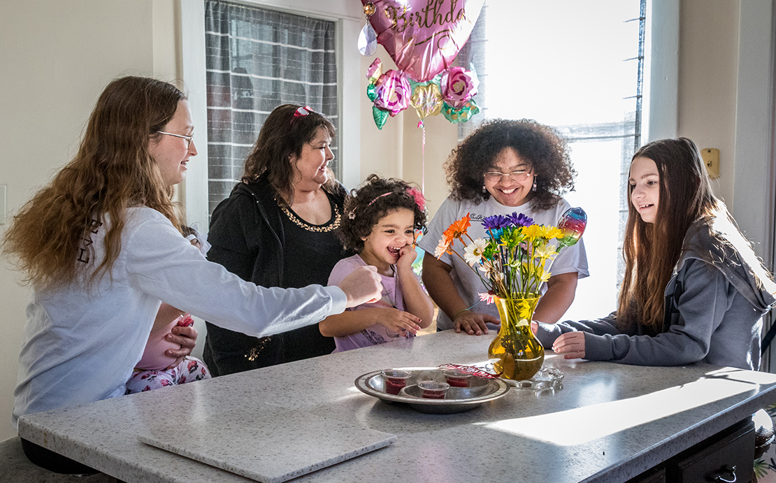 Elizabeth Bujnak takes care of her grandkids through the help of Cardinal Ritter Senior Services’ Relatives as Parents Program (RAPP). She talked with her granddaughters, from left, Isabella Bujnak, Gabriella Washington, Victoria Washington, Angelique Benson and Cadence Kichner in her kitchen in January.