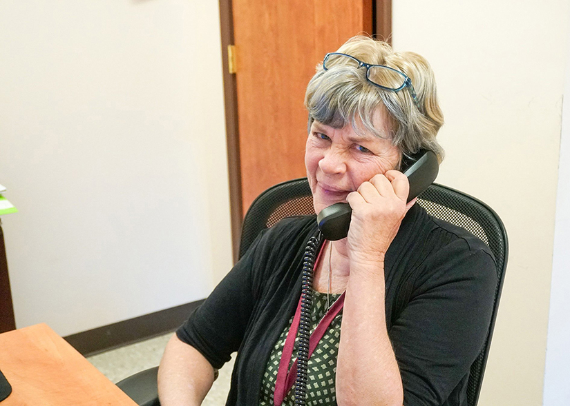Karen McGrath, an employee at the National Shrine of St. Elizabeth Ann Seton in Emmitsburg, Md., helps with the shrine’s prayer hotline ministry begun last year in response to the COVID-19 pandemic. Prayer requests deal with everything from loneliness and illnesses to issues with jobs, families and addiction, she said.